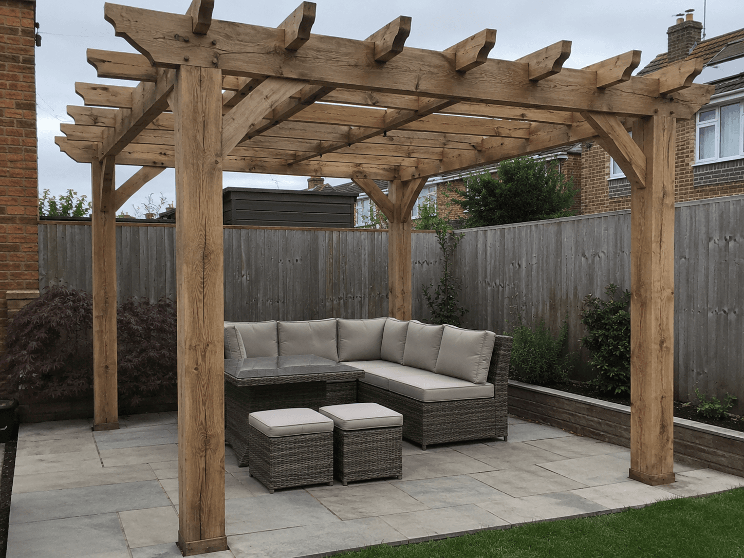 Oak pergola and seating area in Chelmsford — bespoke carpentry by Summerfield Landscapes